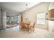 Cozy dining area with views of the screened in porch featuring an open floorplan and lots of light at 1224 Cressford Pl, Brandon, FL 33511
