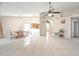 Spacious dining room featuring a view of the kitchen and an open floor plan with ample natural light at 1224 Cressford Pl, Brandon, FL 33511