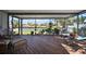 Inviting screened lanai with comfortable seating, picturesque views, and tranquil setting at 1224 Cressford Pl, Brandon, FL 33511
