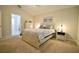 Comfortable bedroom with neutral color palette, soft carpet flooring, and ample natural light at 12820 Bent Twig Dr, Riverview, FL 33579