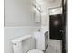 Bathroom featuring a white toilet and vanity at 1629 Dartmouth Dr, Holiday, FL 34691