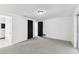 Bedroom includes ensuite bathroom with bathtub and black doors at 1629 Dartmouth Dr, Holiday, FL 34691