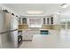 Bright kitchen featuring stainless steel appliances, a double sink, and plenty of natural light at 1629 Dartmouth Dr, Holiday, FL 34691
