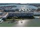 Waterfront building with a beautiful walkway, boat dock, and views of the bay and intercoastal waterway at 1847 Shore S Dr # 215, South Pasadena, FL 33707
