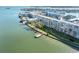 Building features include boat dock, waterfront location, and lush landscaping with city skyline views at 1847 Shore S Dr # 215, South Pasadena, FL 33707
