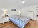 Cozy bedroom featuring a queen-sized bed with matching nightstands at 1847 Shore S Dr # 215, South Pasadena, FL 33707