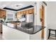This modern kitchen features stainless steel appliances and granite countertops at 1847 Shore S Dr # 215, South Pasadena, FL 33707