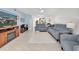 Cozy living room with a fireplace and nice blue accent wall at 1847 Shore S Dr # 215, South Pasadena, FL 33707