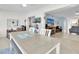 Open floor plan with dining area leading to a bright and inviting living room at 1847 Shore S Dr # 215, South Pasadena, FL 33707