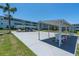 Outdoor shuffleboard courts offer a fun community activity, set against the backdrop of well-maintained lawns and residential buildings at 1847 Shore S Dr # 215, South Pasadena, FL 33707