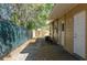 Fenced backyard featuring stone patio, and walkway, perfect for outdoor living at 3235 6Th S Ave, St Petersburg, FL 33701