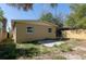 Large backyard, suitable for Gathering activities, has a simple patio at 3235 6Th S Ave, St Petersburg, FL 33701