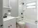 Cozy bathroom featuring updated vanity, white subway tile, and modern black fixtures at 3235 6Th S Ave, St Petersburg, FL 33701
