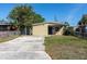 Charming single-story home featuring a concrete driveway and well-maintained yard at 3235 6Th S Ave, St Petersburg, FL 33701