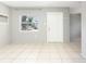 Inviting living area with tile floors, showcasing natural light and a view to the outside at 3235 6Th S Ave, St Petersburg, FL 33701