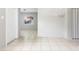 Open living area with tiled floors, ready for personalization and comfortable living at 3235 6Th S Ave, St Petersburg, FL 33701