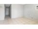 Bright living room with neutral walls and tile flooring, offering a clean and modern space at 3235 6Th S Ave, St Petersburg, FL 33701