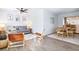 Open concept living room and dining area with modern furnishings and plenty of natural light at 3316 W Ballast Point Blvd, Tampa, FL 33611