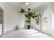 Bedroom filled with lots of light, a ceiling fan, and large potted tree at 3405 W Cherry St, Tampa, FL 33607