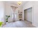 Bright bedroom with carpeted floor, empty closet, toy shelves, and reading nook at 3405 W Cherry St, Tampa, FL 33607
