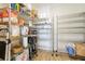 Walk-in pantry equipped with metal shelving for storing food and household items at 3405 W Cherry St, Tampa, FL 33607
