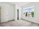 Light-filled bedroom with a closet and a large window offering views of the outdoors at 4275 Big Sky Dr, Spring Hill, FL 34604