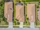 Aerial view showing the layout of a home and its position between neighboring houses at 4372 Water Oak Way, Palm Harbor, FL 34685