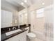 Neutral-toned bathroom featuring granite countertop, a full tub, and decorative accents at 4372 Water Oak Way, Palm Harbor, FL 34685