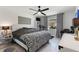 Spacious bedroom with zebra patterned bedspread, mirrored nightstand, and neutral paint at 4400 37Th S St # 4, St Petersburg, FL 33711