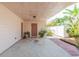 Covered carport with exposed ceiling and tropical landscaping at 4517 S Renellie Dr, Tampa, FL 33611