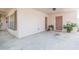 Covered carport with exposed ceiling and tropical landscaping at 4517 S Renellie Dr, Tampa, FL 33611