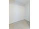 Empty room ready for customization with neutral wall paint and unique terrazzo flooring at 4517 S Renellie Dr, Tampa, FL 33611