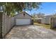 Spacious detached garage with ample driveway space and a well-maintained exterior at 511 27Th N Ave, St Petersburg, FL 33704