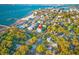 Breathtaking aerial view of a coastal community, showcasing beautiful waterfront views, a pier, and beaches at 5402 31St S Ave, Gulfport, FL 33707
