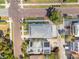 Bird's-eye view of home and neighborhood highlighting the roof, landscaping, and proximity to neighboring houses at 5402 31St S Ave, Gulfport, FL 33707