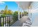 Spacious balcony featuring a cozy seating area, perfect for relaxing and enjoying the views at 5402 31St S Ave, Gulfport, FL 33707