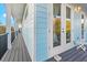 Balcony featuring an outdoor seating area with doors that open up to a cozy interior space at 5402 31St S Ave, Gulfport, FL 33707