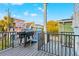 This charming balcony features an outdoor grill, perfect for enjoying cooking and entertaining outdoors at 5402 31St S Ave, Gulfport, FL 33707