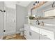 Stylish bathroom featuring a walk-in shower with marble tile and a white vanity at 5402 31St S Ave, Gulfport, FL 33707
