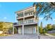 Amazing three-story home with balconies and outdoor entertainment space at 5402 31St S Ave, Gulfport, FL 33707