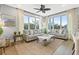 Bright and airy living room with large windows and comfortable seating at 5402 31St S Ave, Gulfport, FL 33707