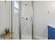 Modern bathroom showing a glass shower and blue vanity at 5402 31St S Ave, Gulfport, FL 33707