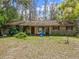 Charming home nestled on a large lot with beautiful mature trees offering natural shade at 6302 Fitzgerald Rd, Odessa, FL 33556