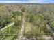 A beautiful lot with a long driveway leading to a serene, private homesite at 6302 Fitzgerald Rd, Odessa, FL 33556