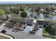 Aerial view of waterfront neighborhood, houses, and landscaping at 641 Bay Lake Trl, Oldsmar, FL 34677