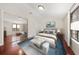 Comfortable bedroom featuring a spacious layout, a large window, and neutral tones to create a cozy atmosphere at 641 Bay Lake Trl, Oldsmar, FL 34677