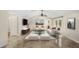 Living room featuring vaulted ceilings, tile floors, and french doors to the outdoor area at 641 Bay Lake Trl, Oldsmar, FL 34677