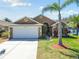 Beautiful single-story home with a well-maintained lawn and inviting curb appeal at 7222 Sharpsburg Blvd, New Port Richey, FL 34653