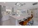 Modern kitchen with a large island, seating, stainless steel appliances and ample cabinet space at 7998 Causeway N Blvd, St Petersburg, FL 33707