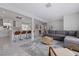 Inviting open-concept living area with modern furnishings and a view of the kitchen at 7998 Causeway N Blvd, St Petersburg, FL 33707